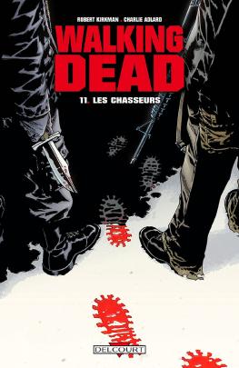 Couverture du Comics WALKING DEAD T11 LES CHASSEURS de Robert kirkman - Editions Delcourt